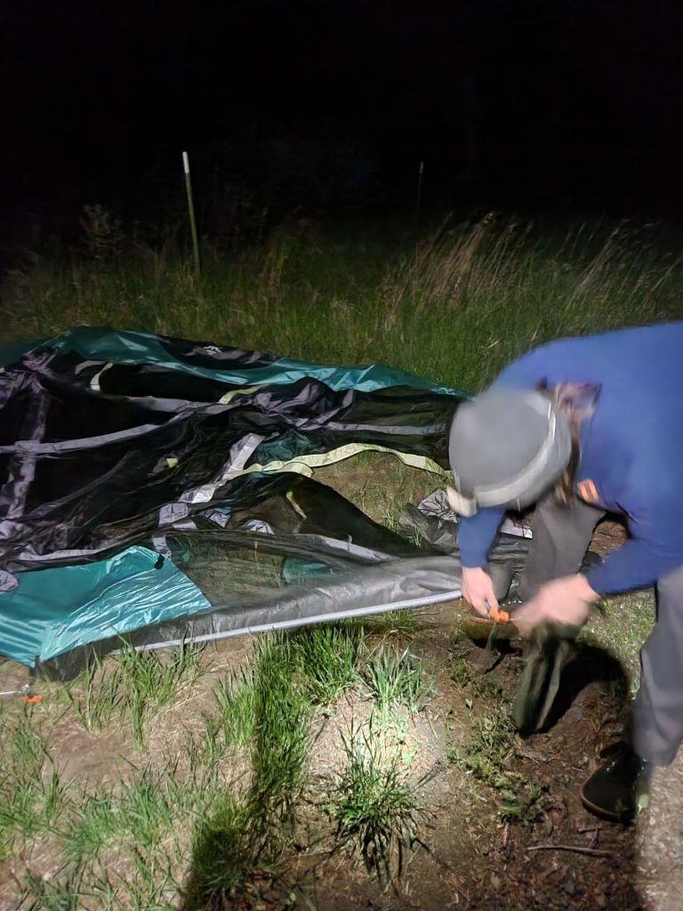 Jon-David taking down the tent