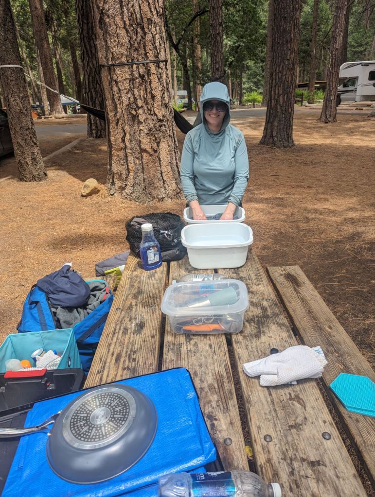 Molly doing laundry in camp