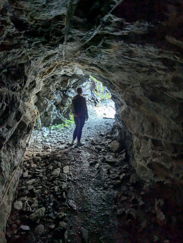 Molly hiking in a tunnel.