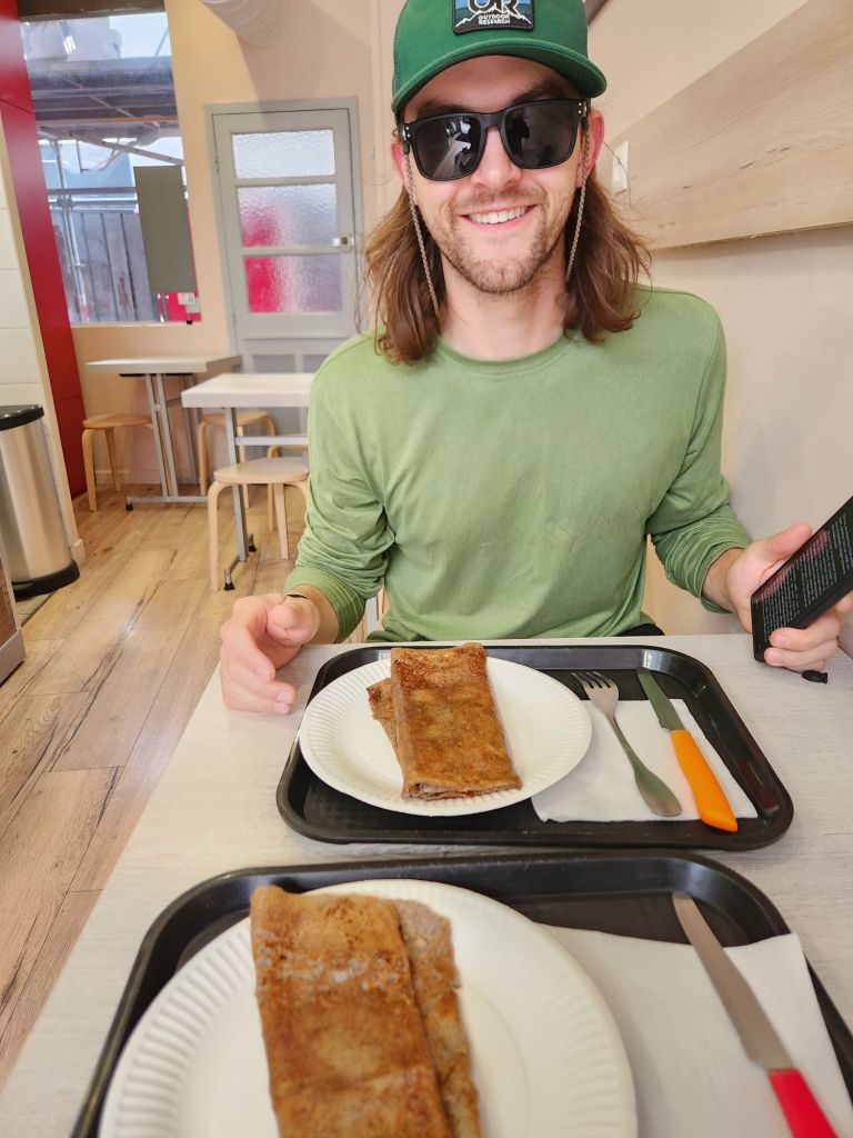 Jon-David eating crepes